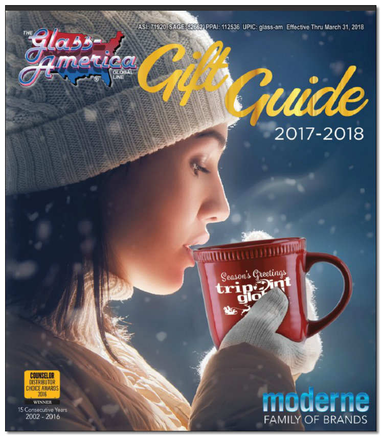 Woman holding mug in winter attire.