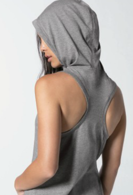 Person wearing gray hooded sleeveless top.
