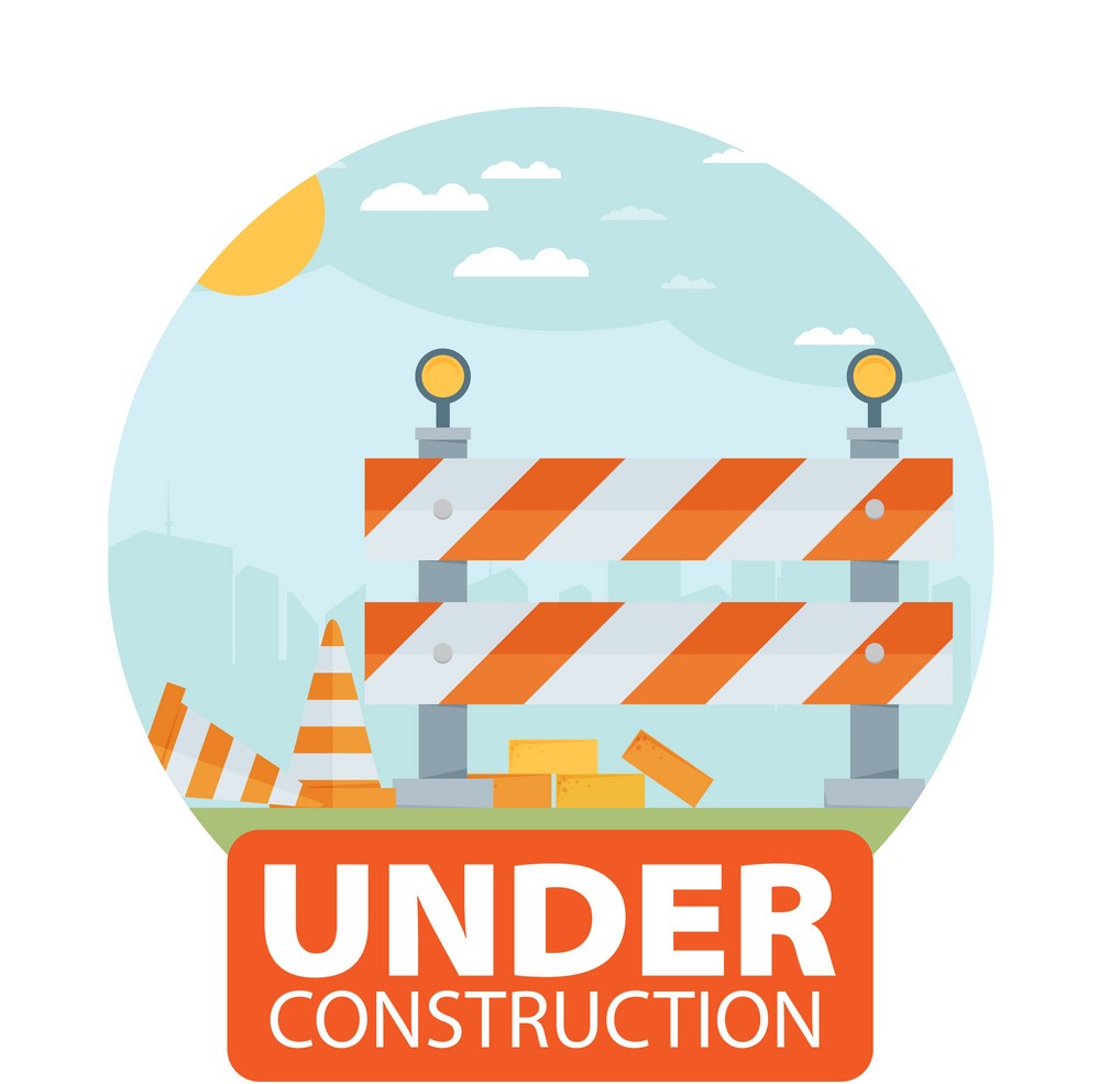 Under construction sign with barricades illustration.