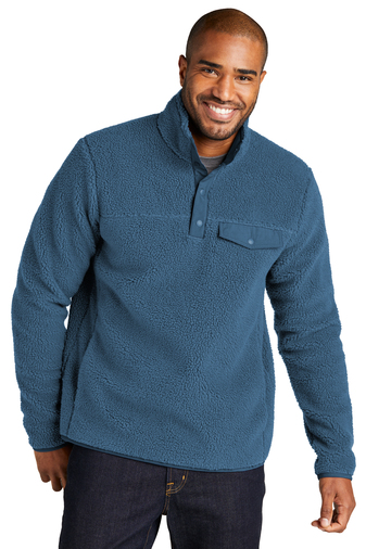Man wearing a blue fleece pullover.