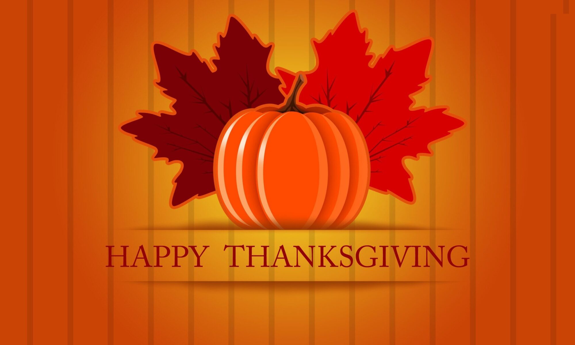 Pumpkin and leaves with "Happy Thanksgiving" text.