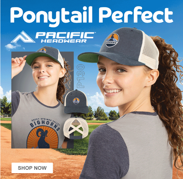 Woman wearing baseball cap, ponytail style.
